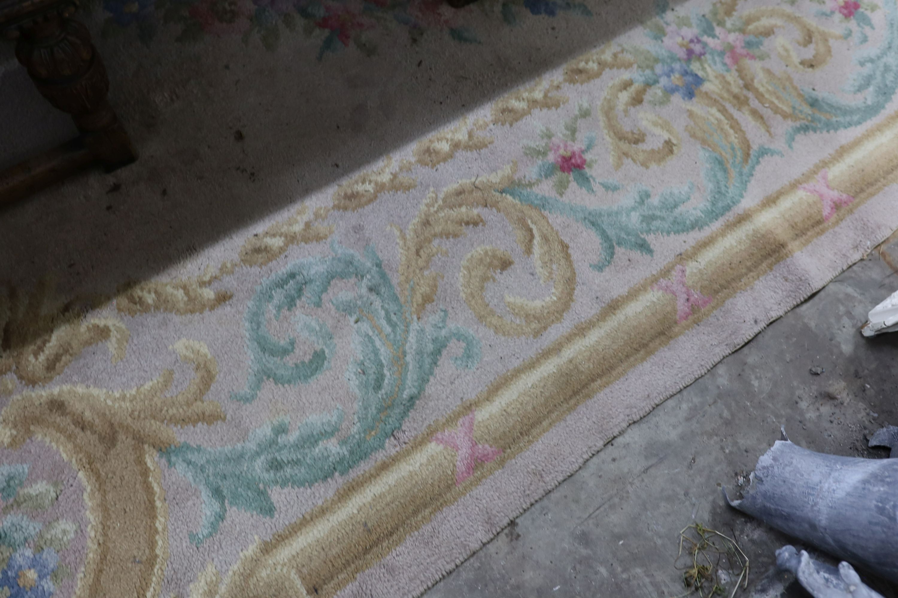 An Aubusson style fawn ground wool carpet, 360 x 260cm